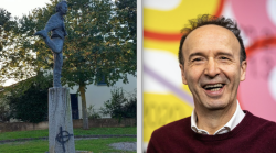 Croce celtica sulla statua di Roberto Benigni nel suo paese natale