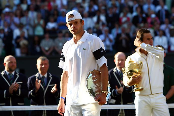 Andy Roddick e Roger Federer - Wimbledon 2009 via Getty Images