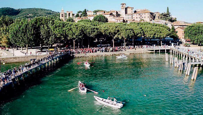 Passignano torna nel Medioevo con il Palio delle Barche: sfoglia l'inserto 