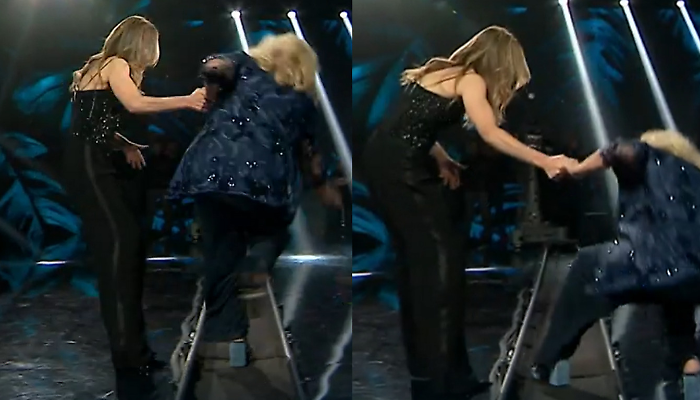 Belve, il senso del binario presente sul palco. Ecco perché esiste la passerella che separa l'ospite dal pubblico (e lo fa inciampare)