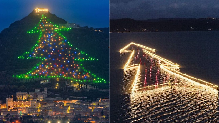 Gli alberi di Natale più suggestivi d’Italia si trovano in Umbria: uno sul lago e uno in montagna (il più grande del mondo)